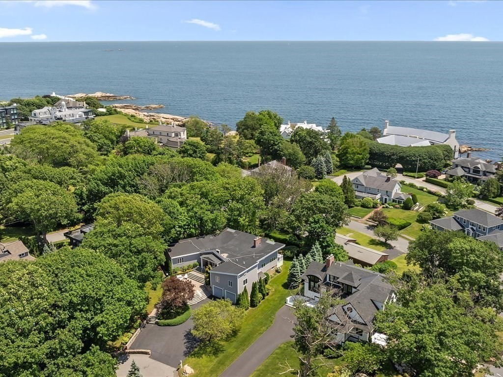 a aerial view of a house with a lake view