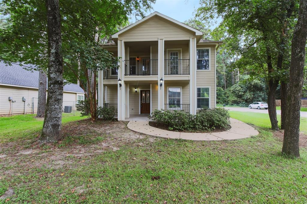 Charming Southern Living style 2 story with balcony and front porch.  No back neighbors!