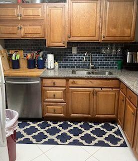 a kitchen with a sink and a stove