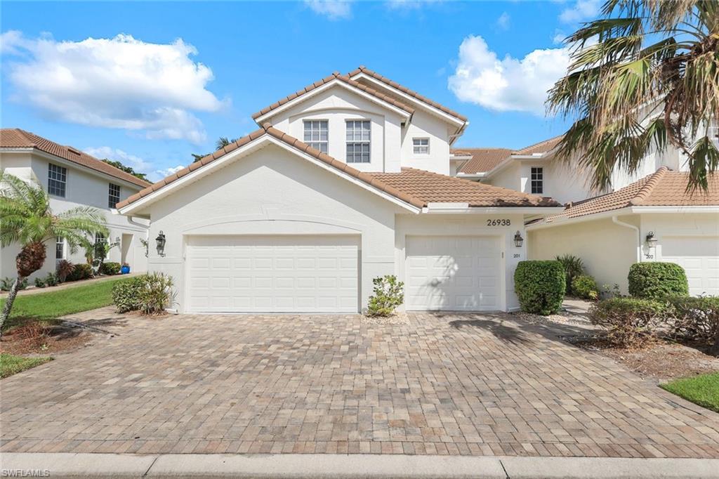 1st Floor Unit with Two Car Garage and Lake View