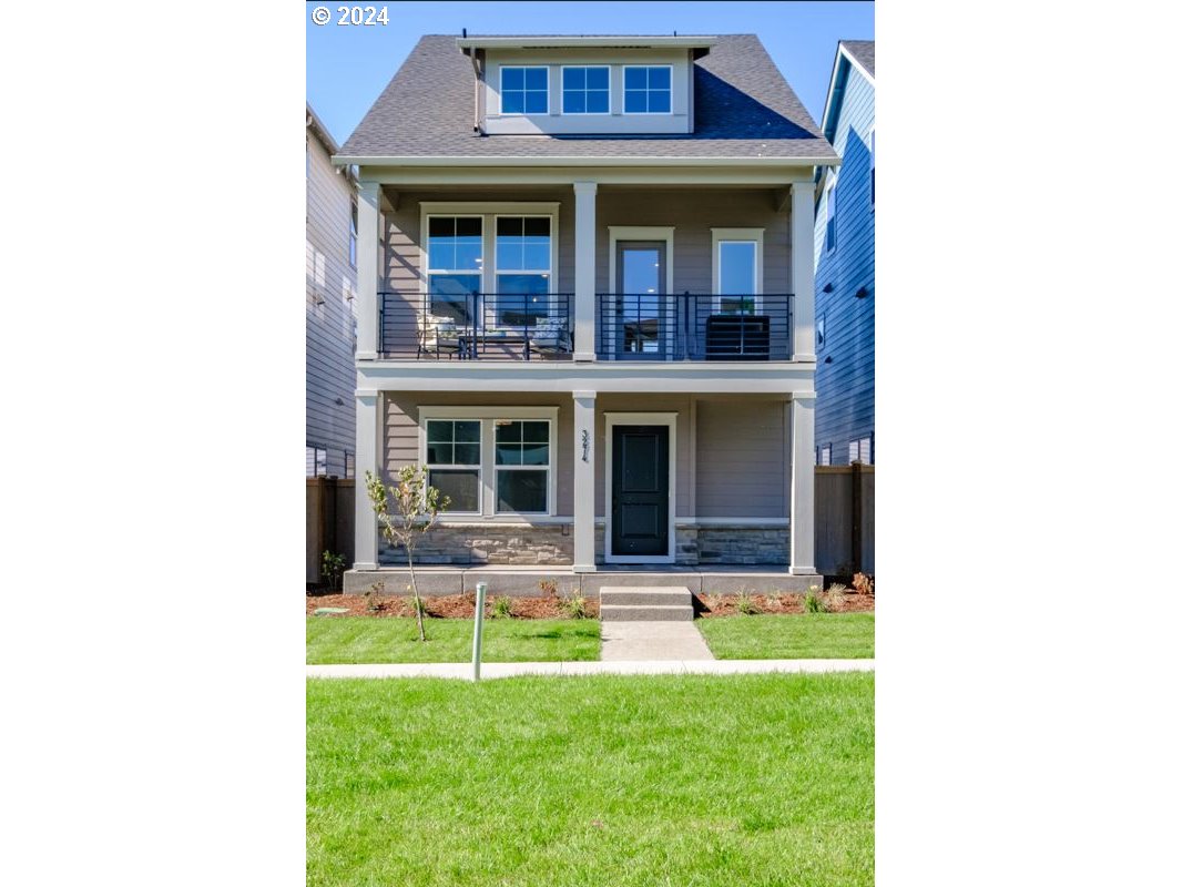 a view of a house with a yard porch and sitting area