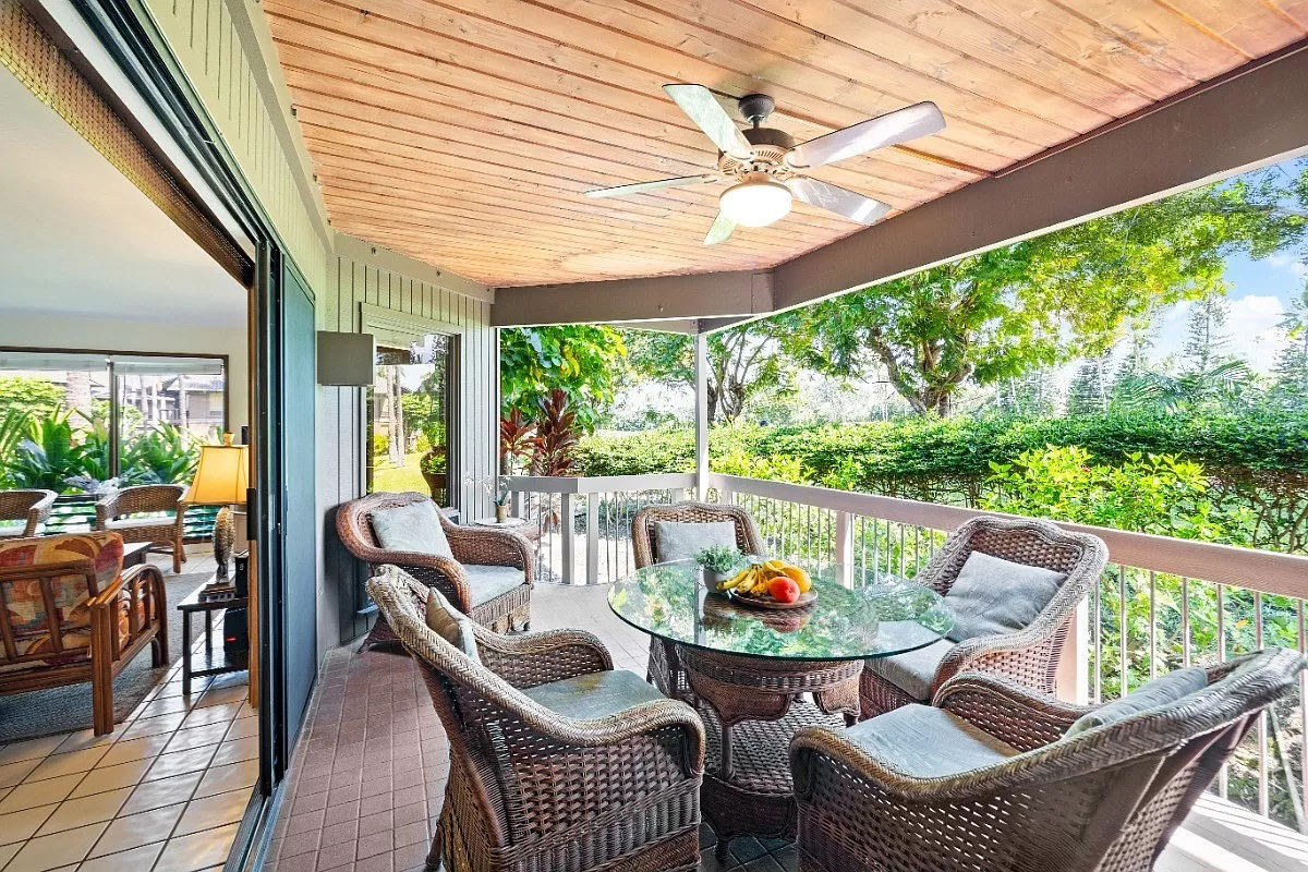 a outdoor dining space with furniture and garden view