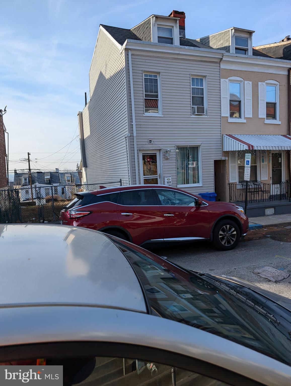 a car parked in front of a house