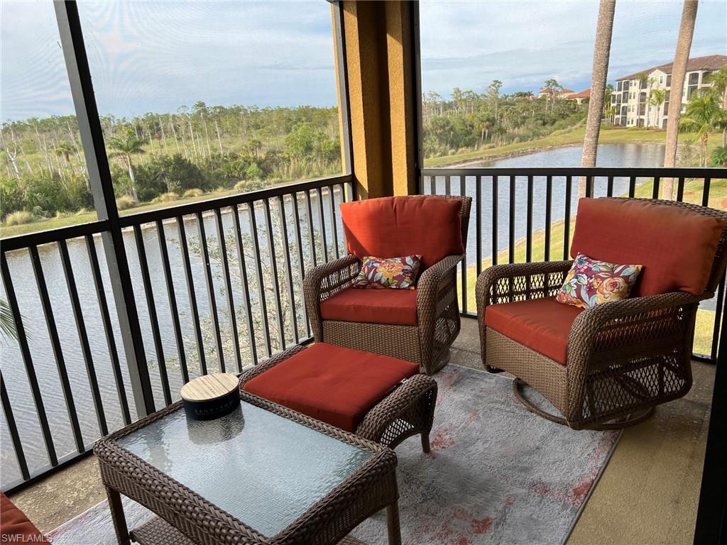 a balcony with outdoor seating