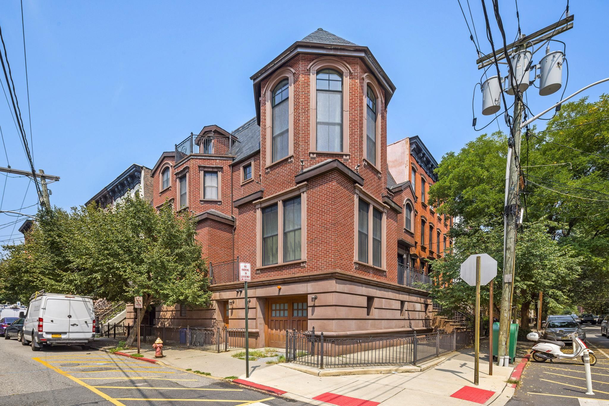 a front view of a building with street view