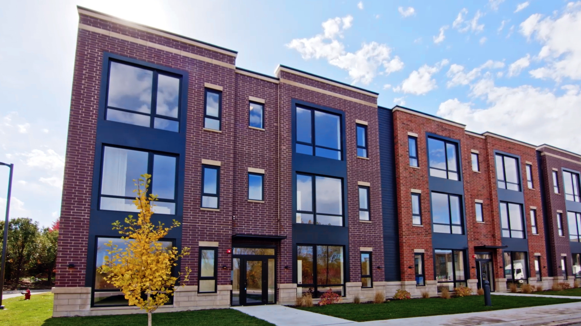 a front view of multi story residential apartment building