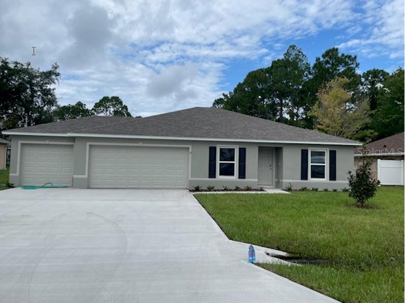 front view of house with a yard