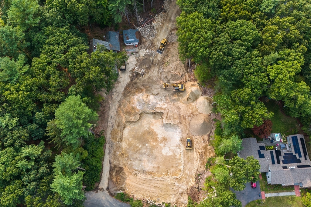 an aerial view of residential house with outdoor space