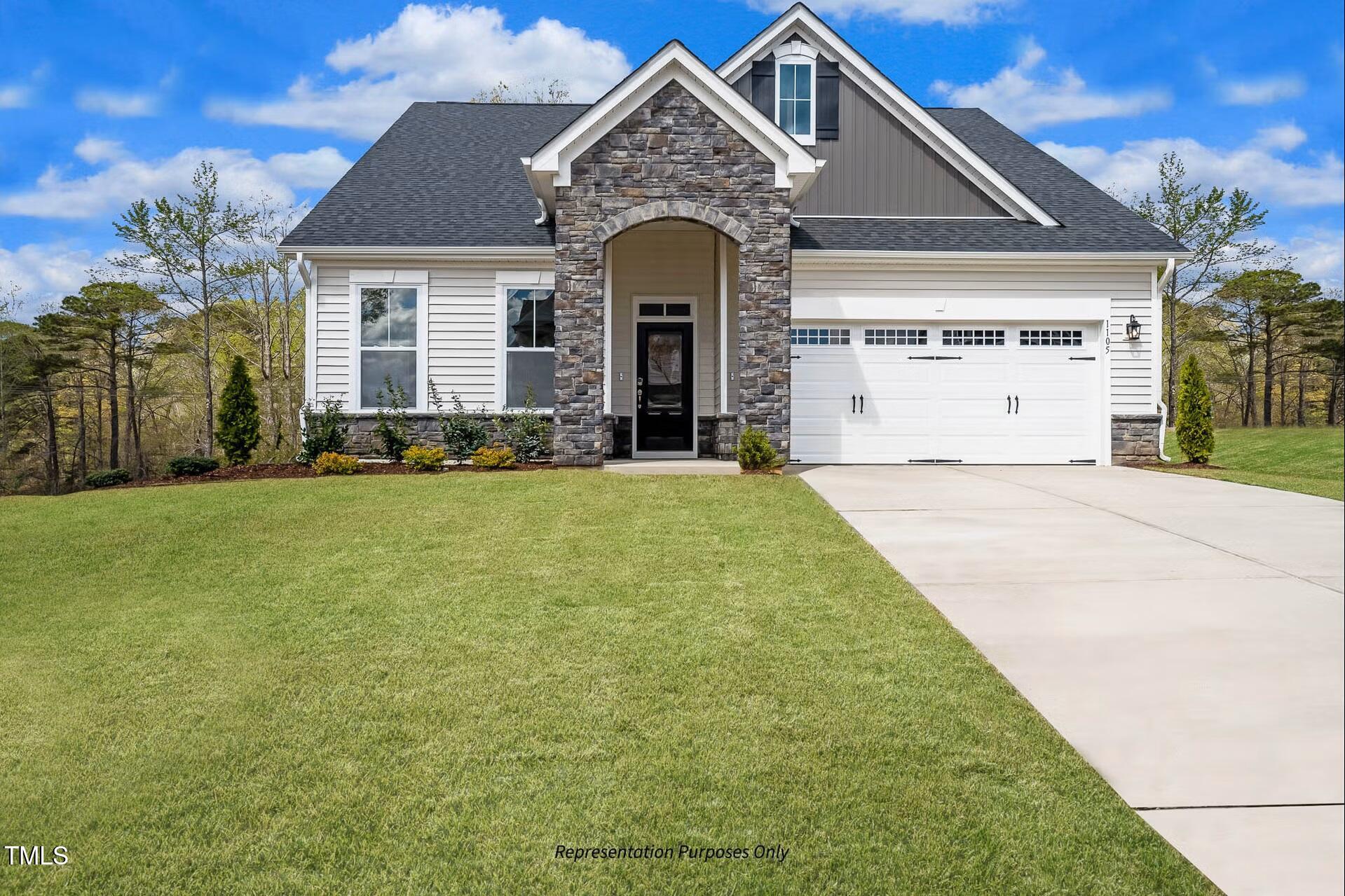 a front view of a house with yard