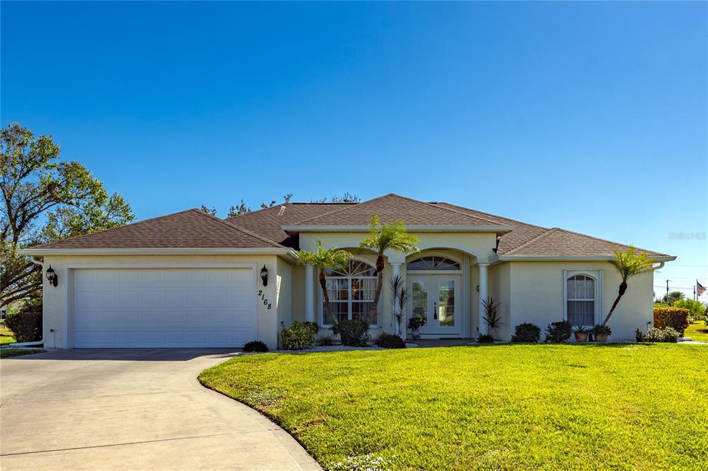 a front view of a house with yard