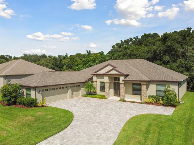 $749,000 | 13602 Carryback Drive | Lake Jovita Golf and Country Club