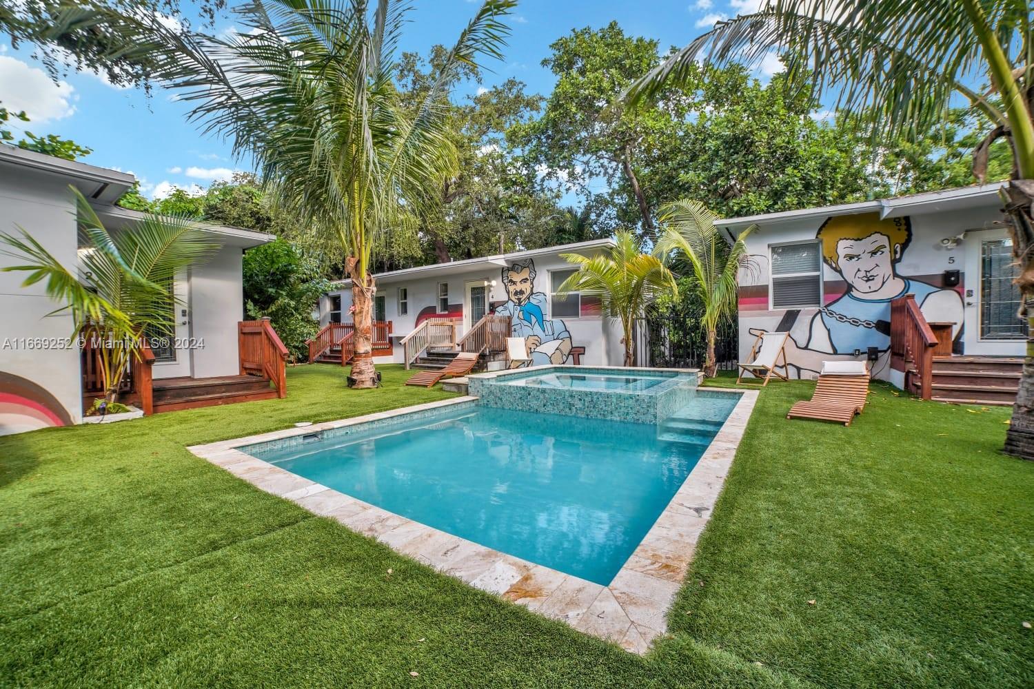 swimming pool view with outdoor seating