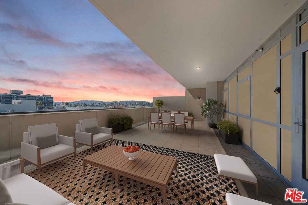 a view of a balcony with furniture