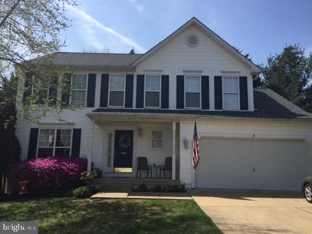 a front view of house with yard