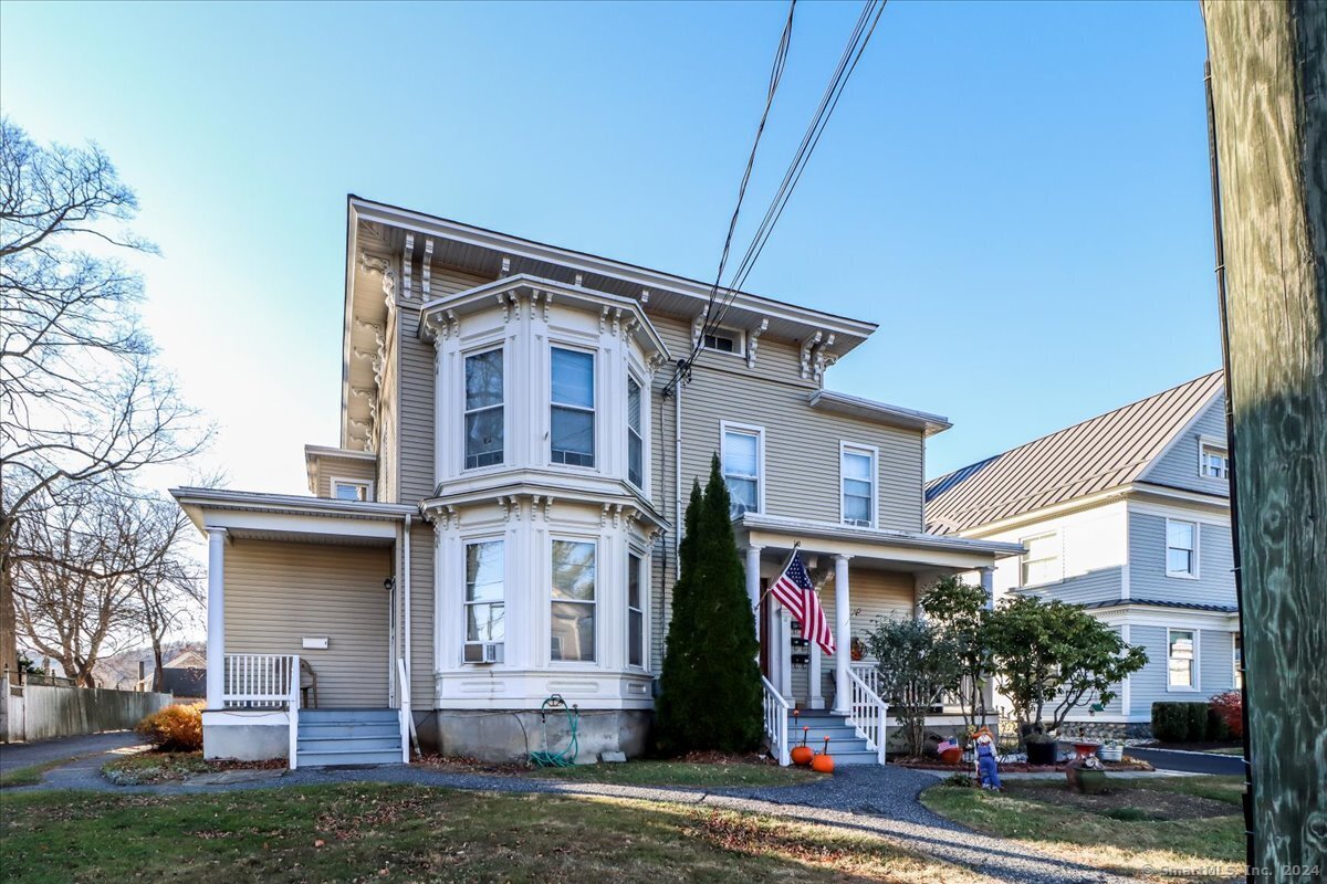 a front view of a house with a porch