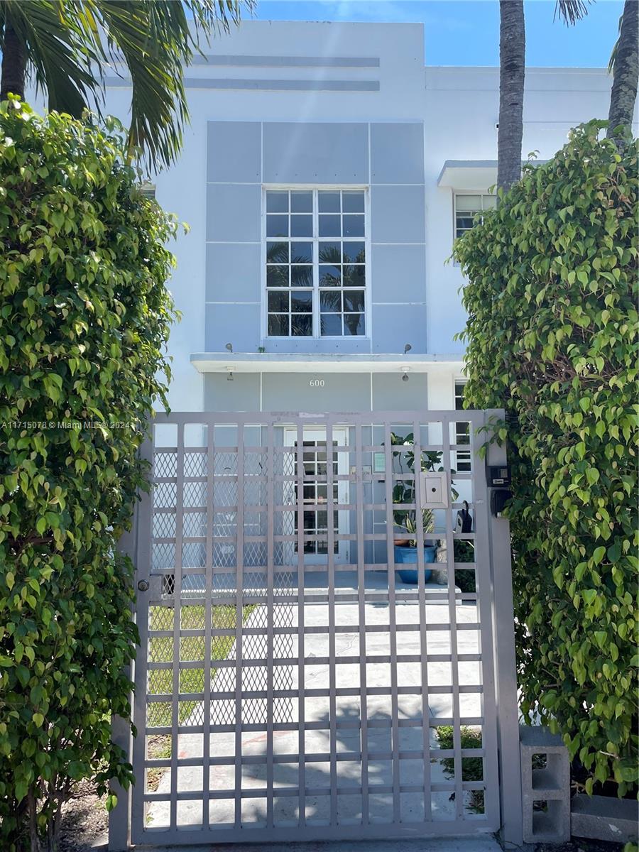 a front view of a house with a garage