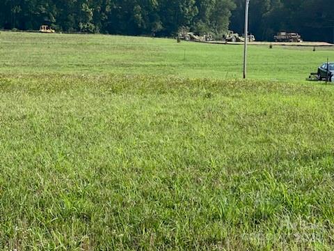 a view of a field with grass