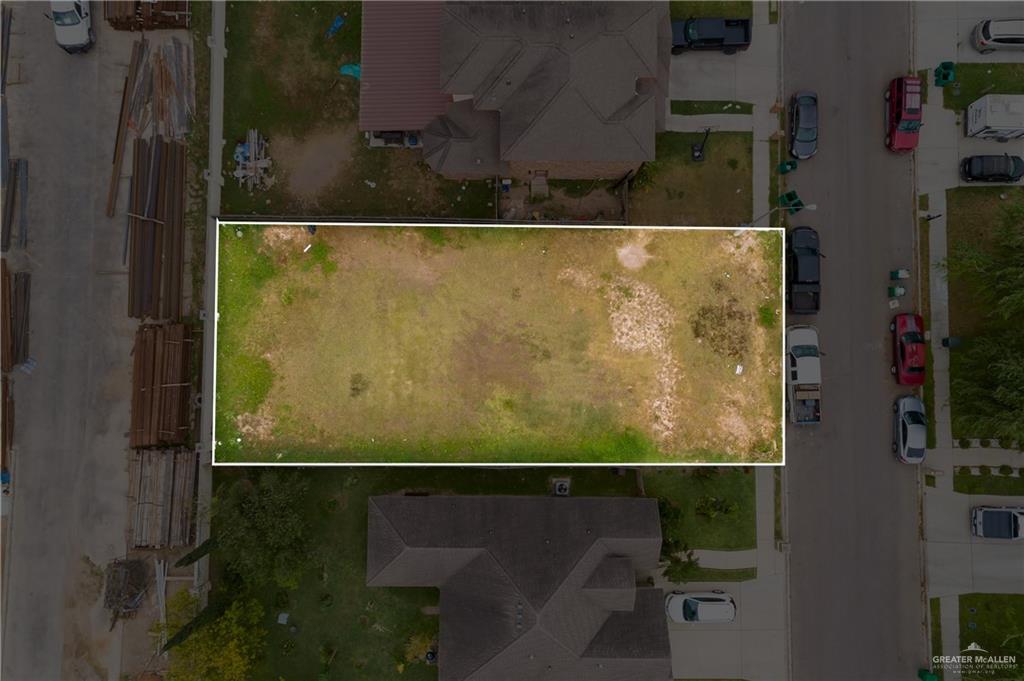 an aerial view of residential house with outdoor space