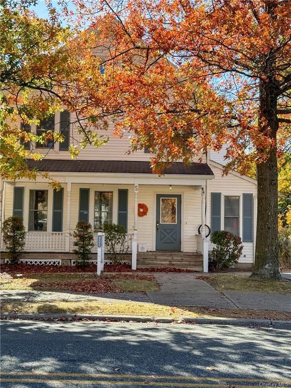 View of front of home with covered porch