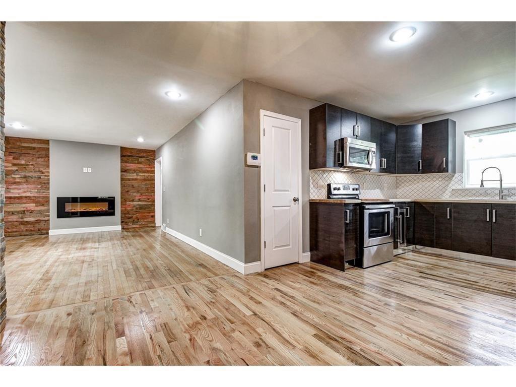 a view interior of kitchen and kitchen with wooden floor