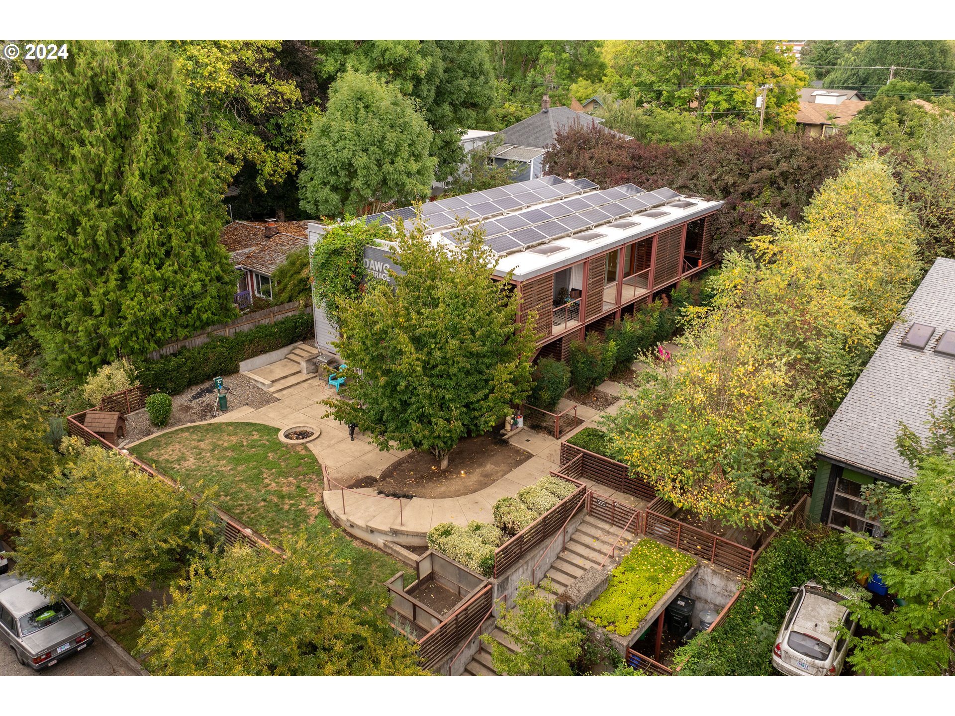 a view of a backyard with plants