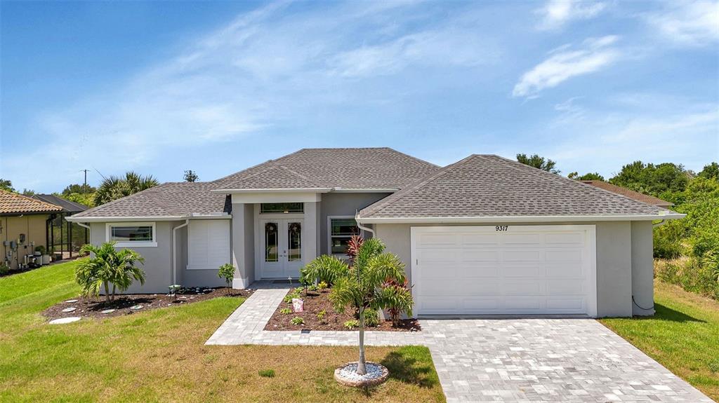 front view of a house with a yard