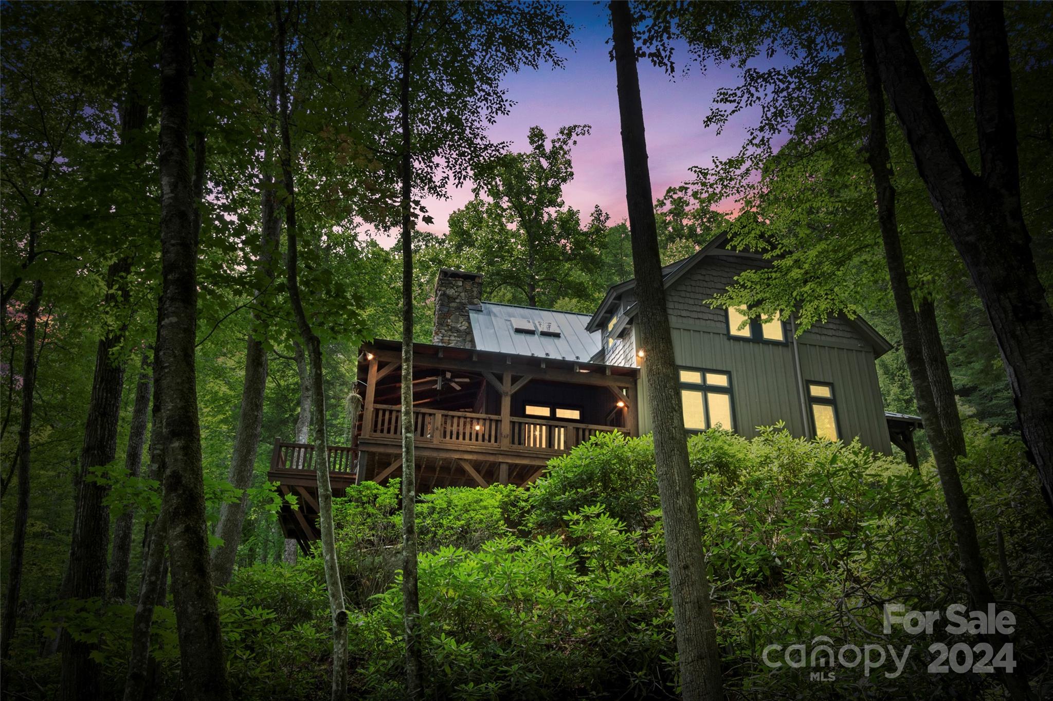 a view of a house with a backyard space