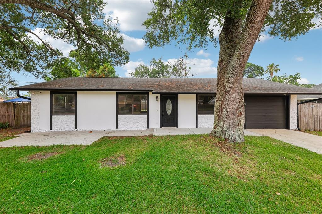 front view of a house with a yard