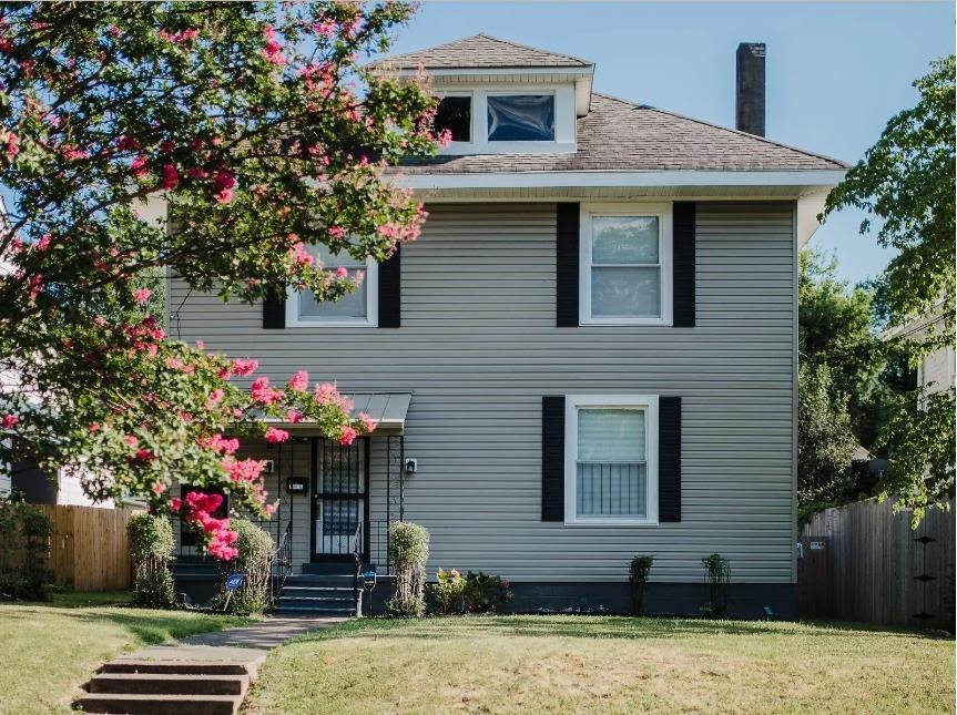 a front view of house and yard