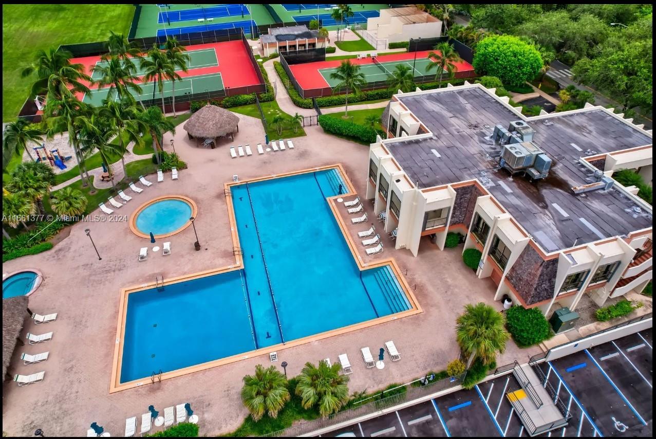 an aerial view of a house with outdoor space and street view