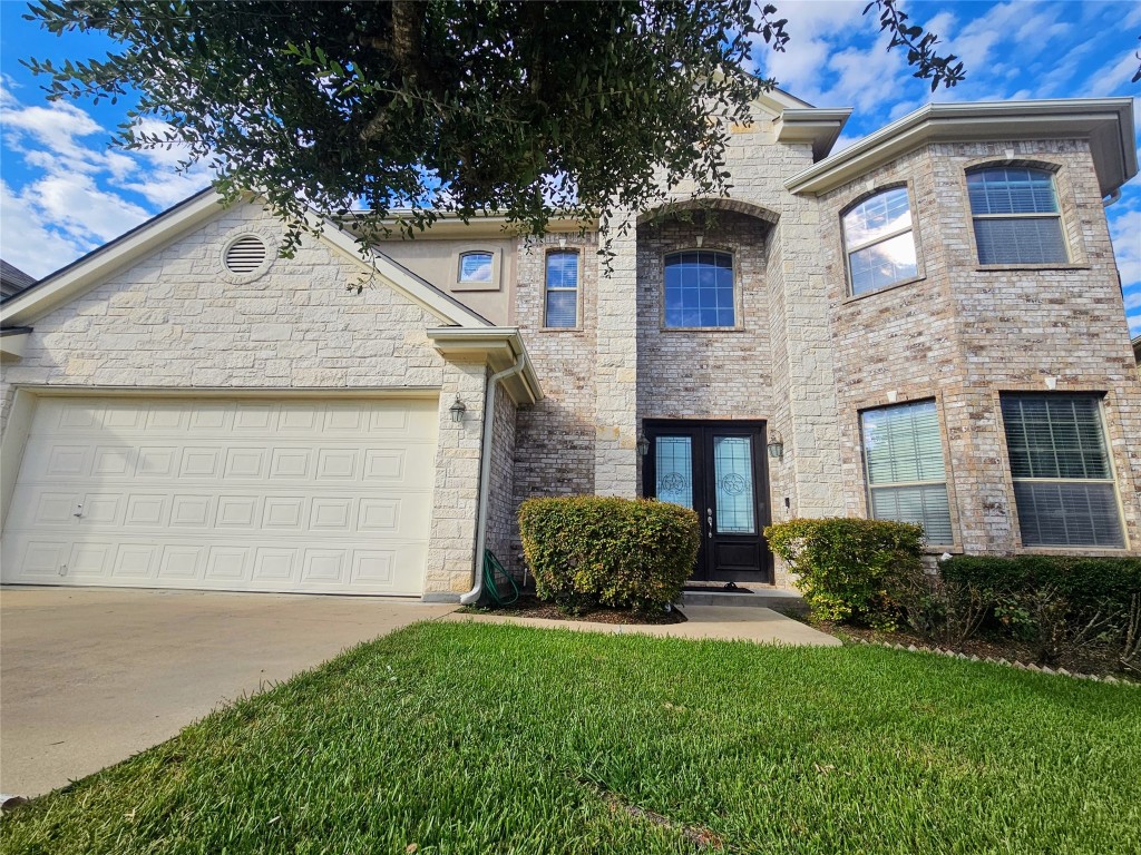 Custom 2-story home in coveted neighborhood