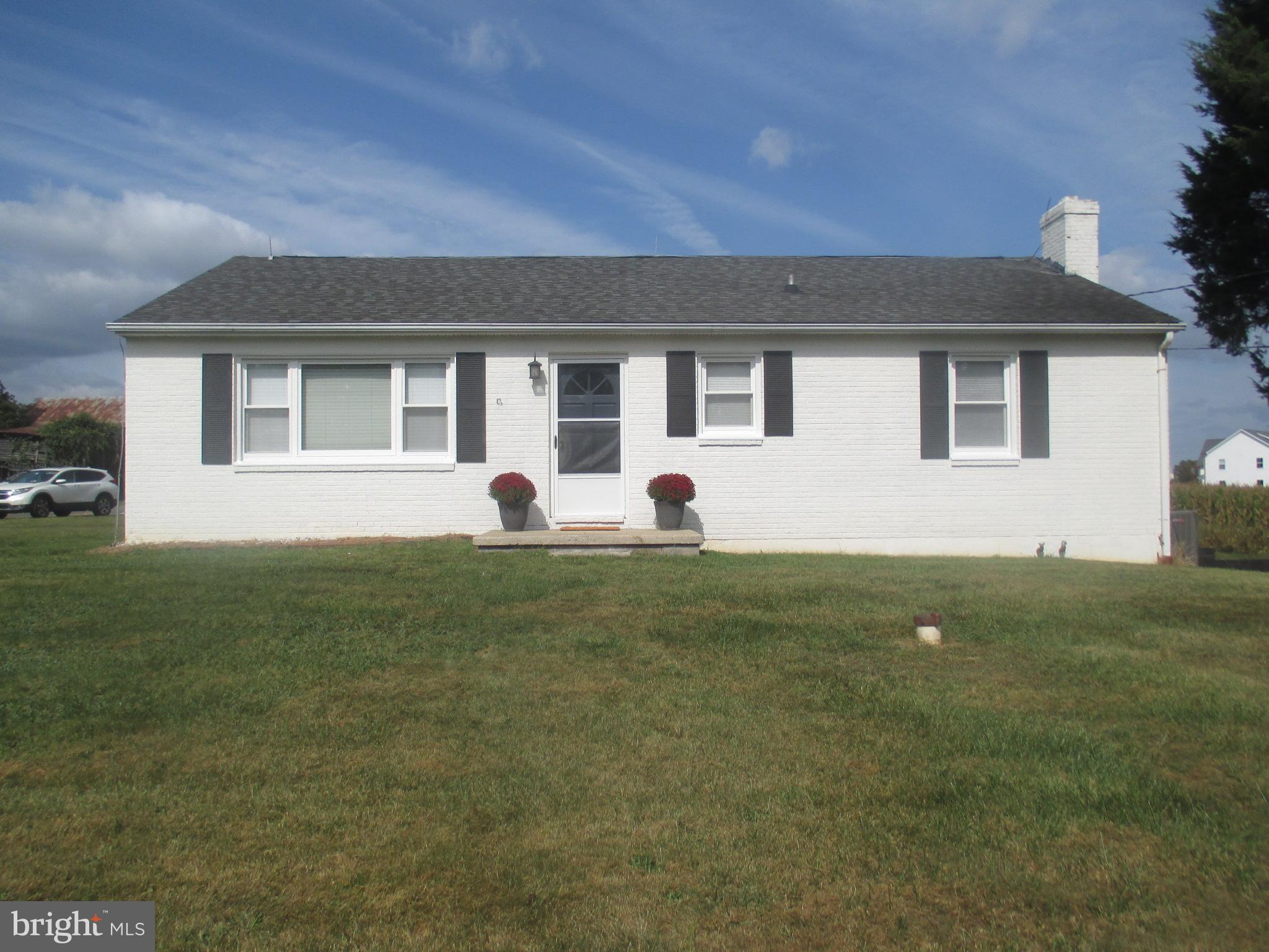 a front view of house with yard