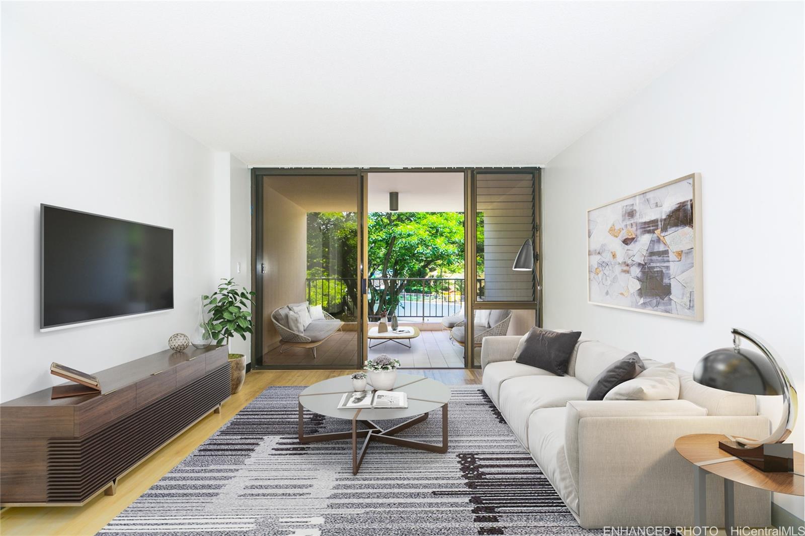 a living room with furniture and a flat screen tv