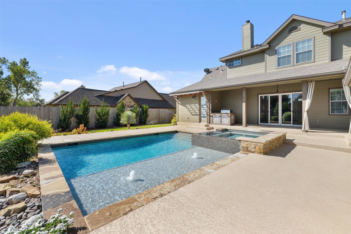 a view of a building with a swimming pool