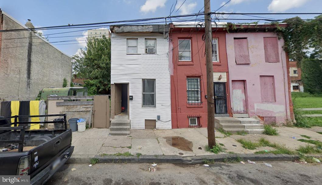 a front view of a house with yard