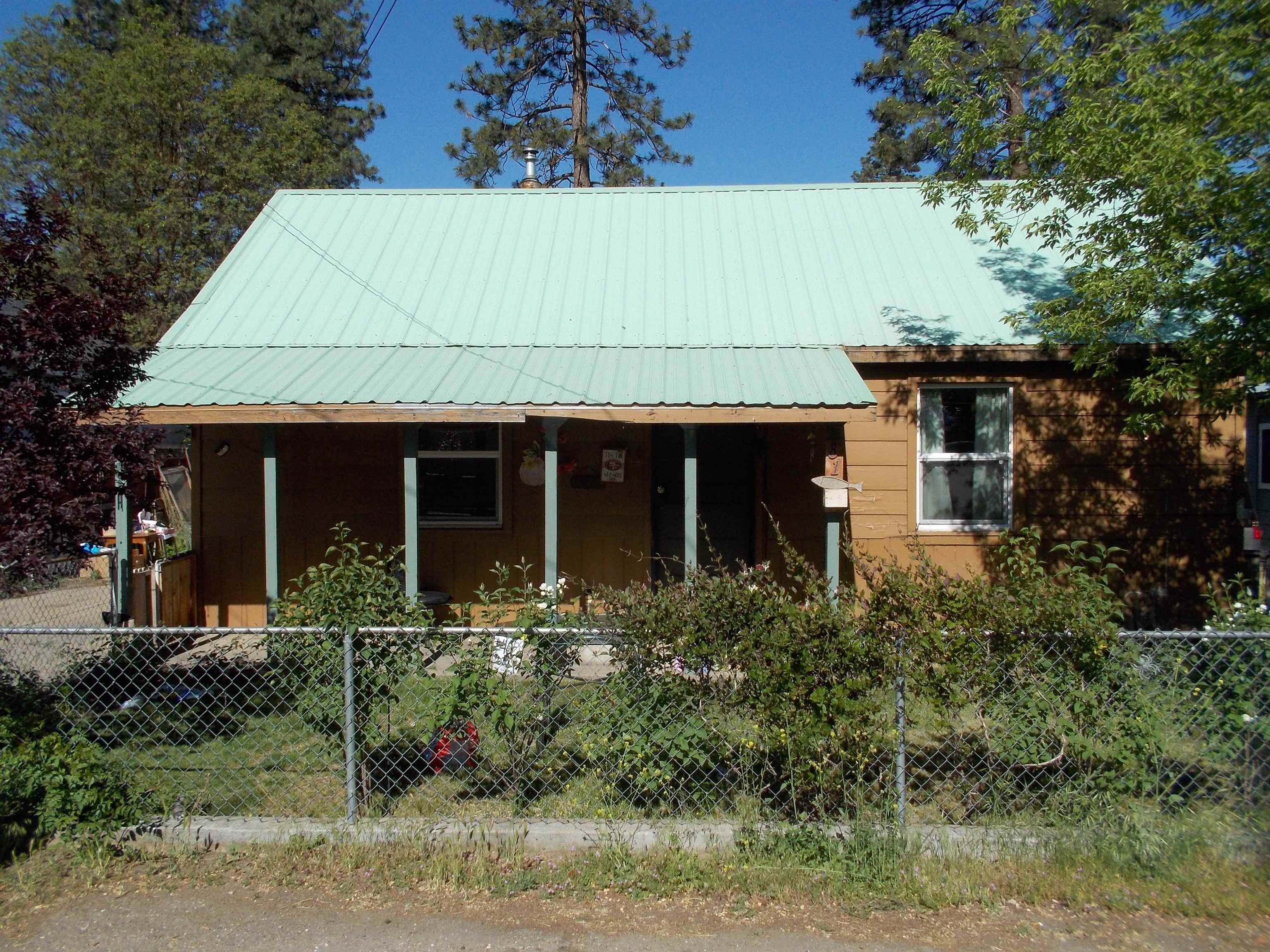 front view of a house with an outdoor space