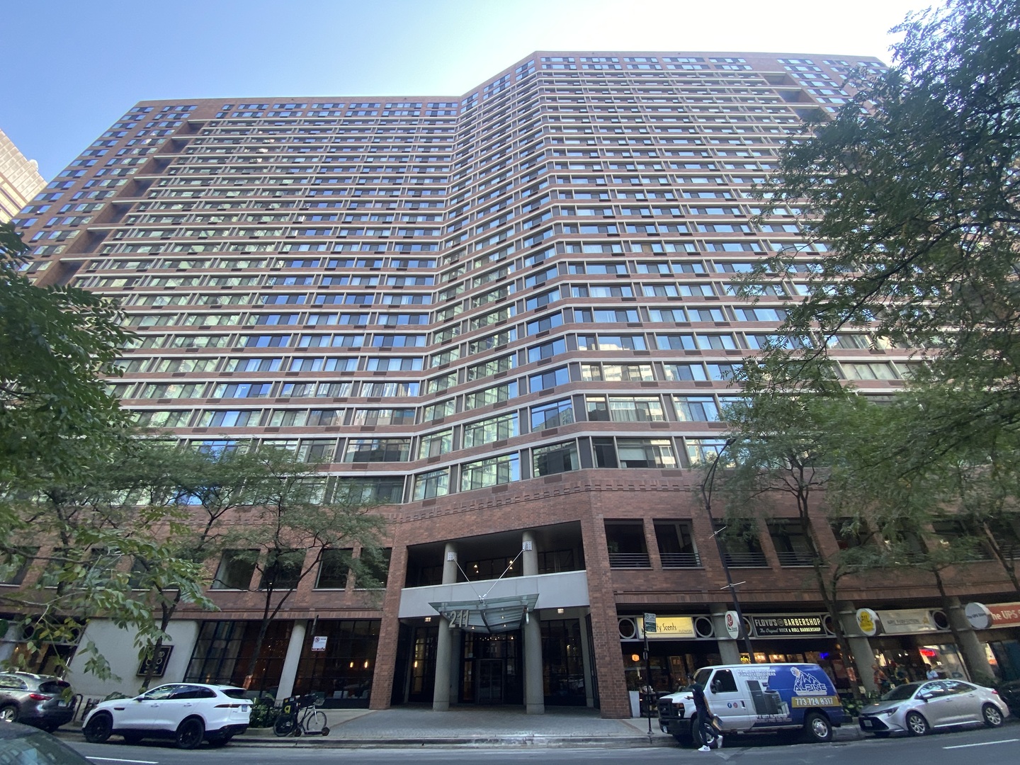 a front view of a building with street view