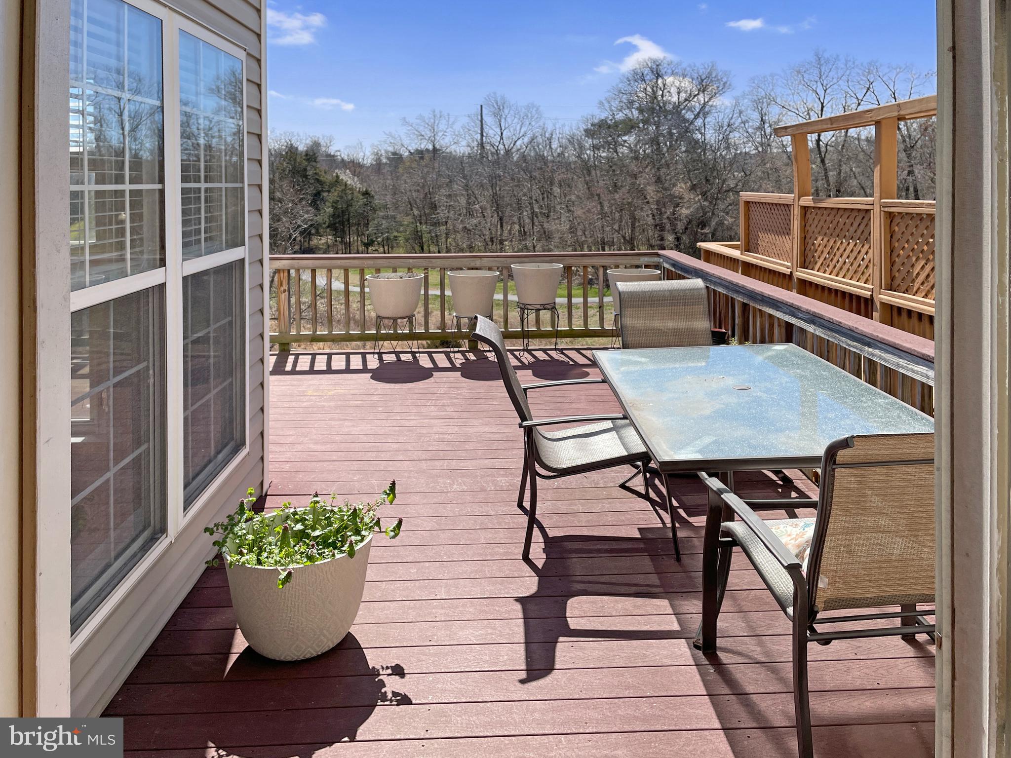 a view of a chairs and table on the terrace