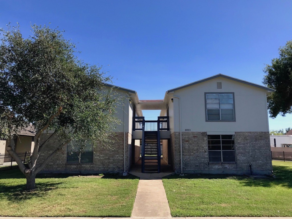 a front view of house with yard