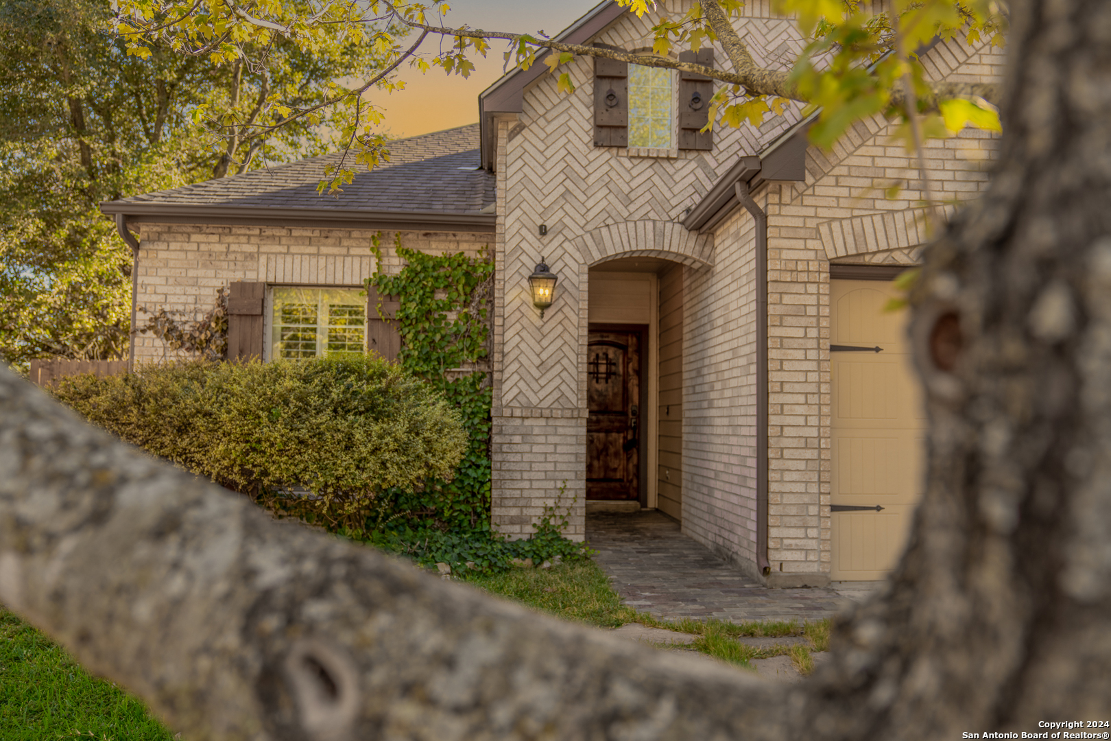 a front view of a house with a yard