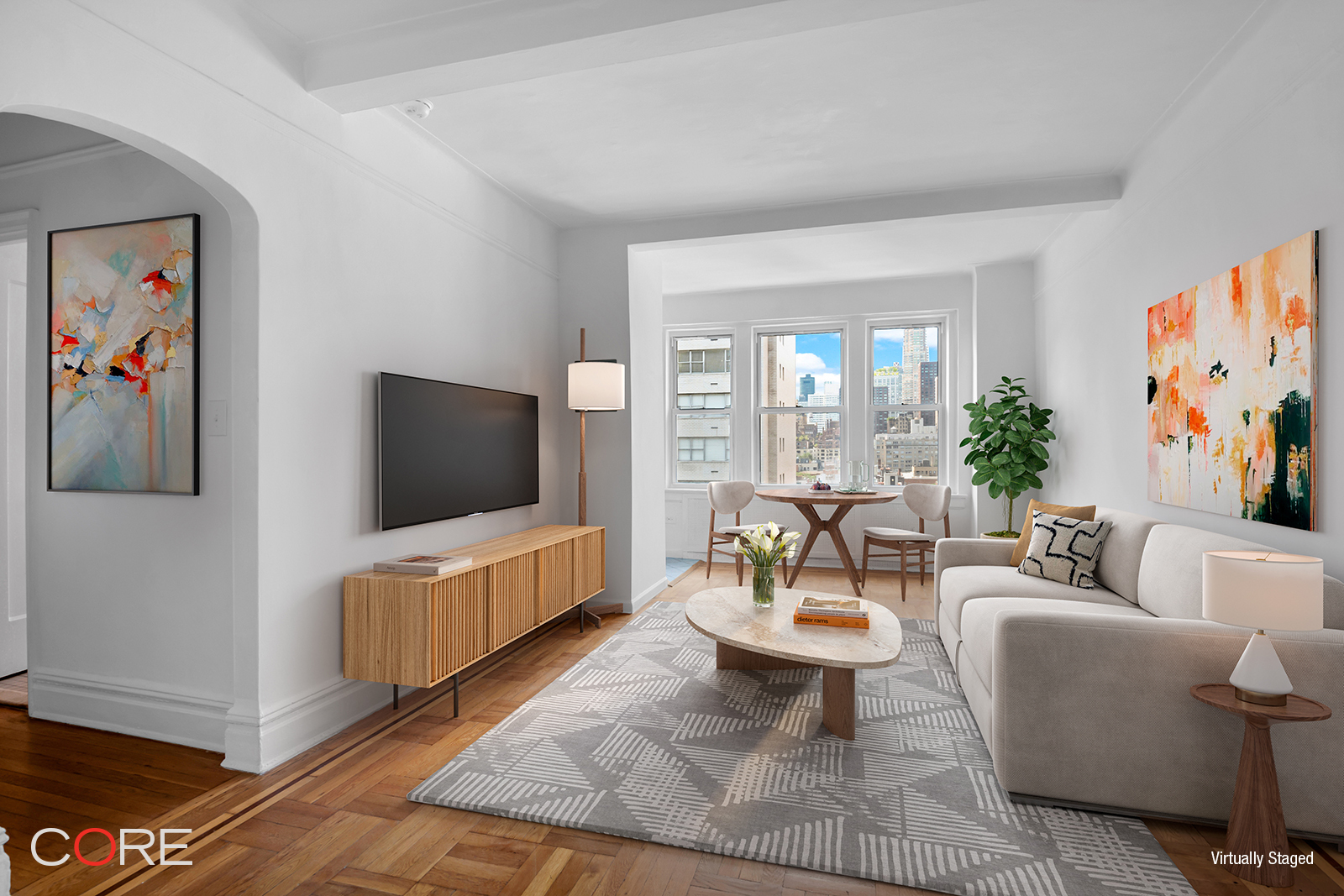 a living room with furniture and a flat screen tv