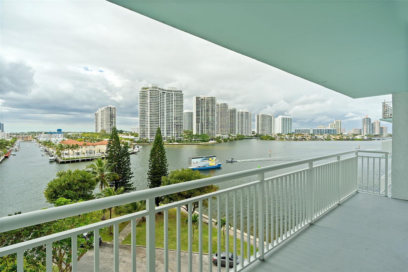 a view of a city skyline from a balcony