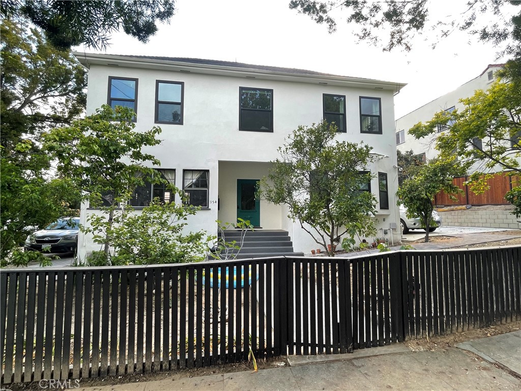 a front view of house with yard