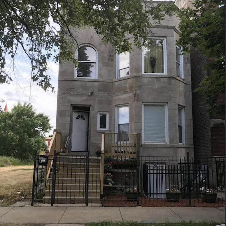 front view of a house with a street