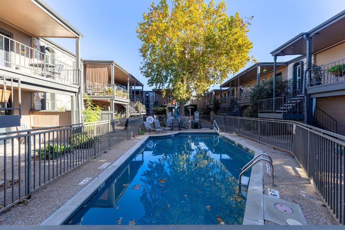 a swimming pool view with a outdoor space