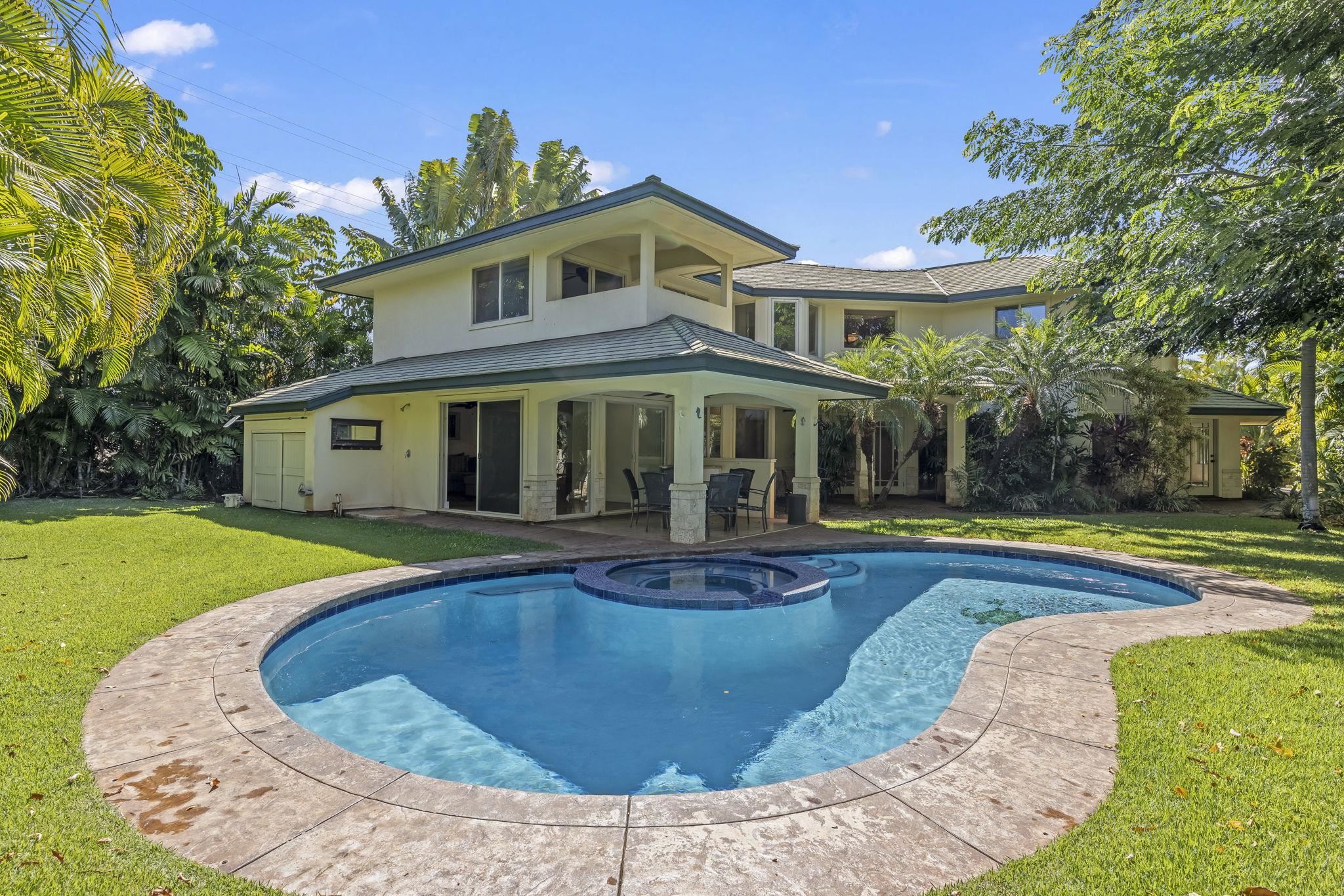 a view of a house with swimming pool