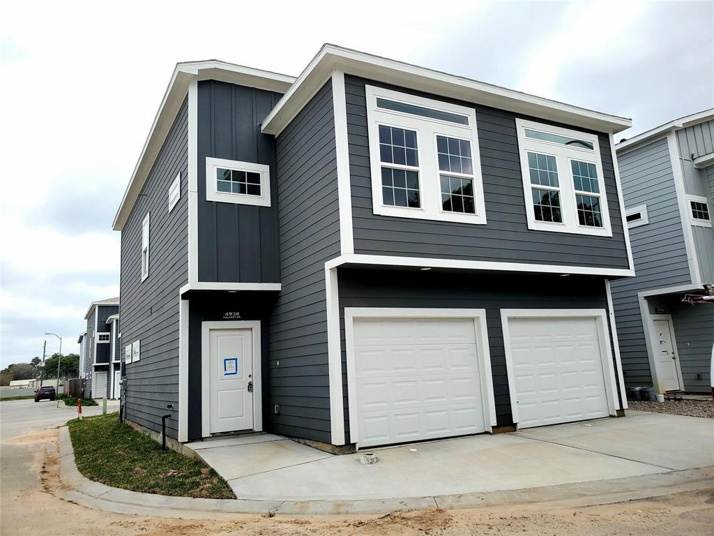 a front view of a house with a garage