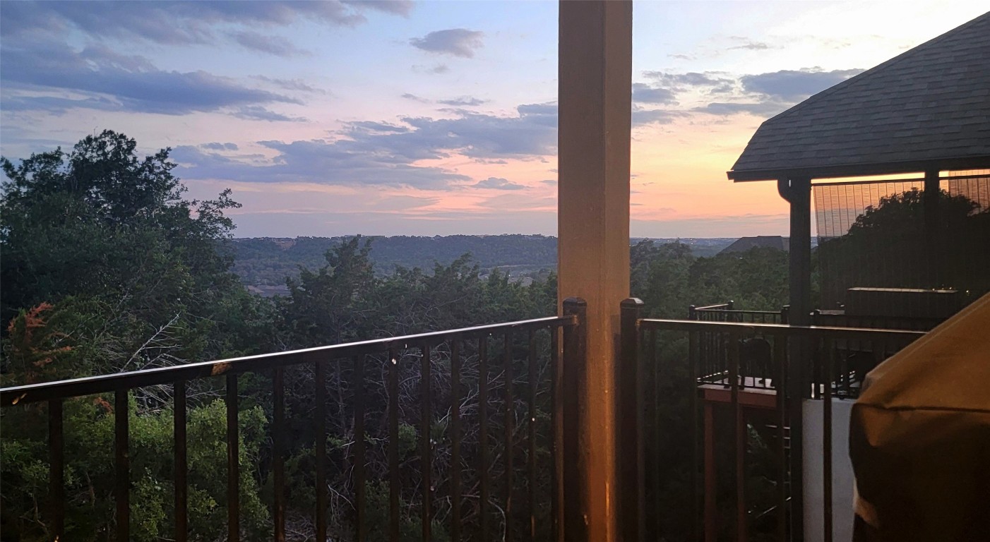 a balcony view with an outdoor space