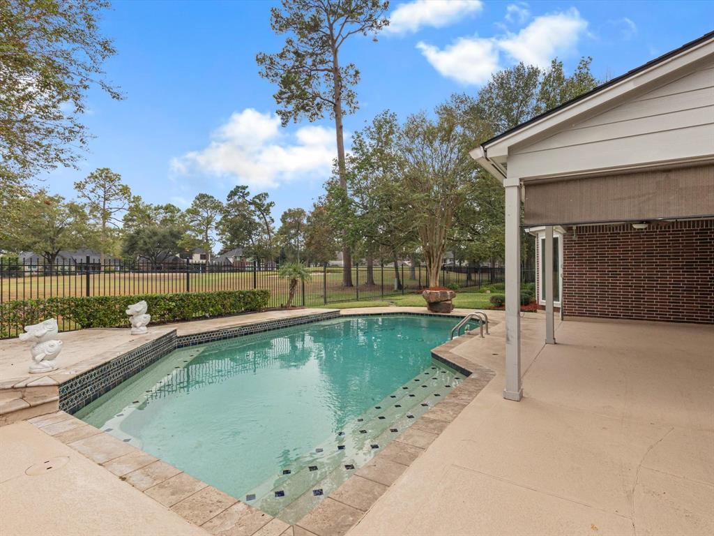 a view of a house with swimming pool