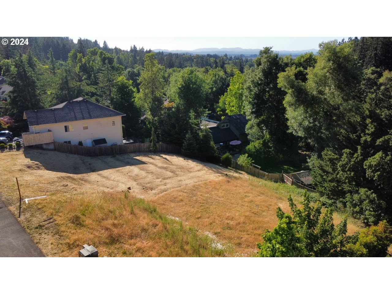 a view of a backyard with a mountain